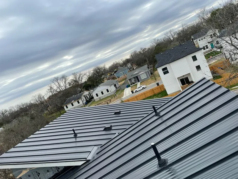 Standing seam metal roof panels with vents for Skylight Repair in Peterborough